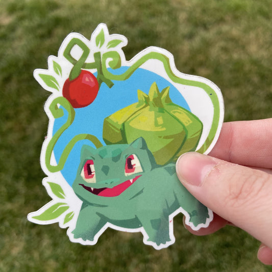 A vinyl sticker of the Pokemon Bulbasaur and a Cheri berry, an in-game item. Bulbasaur is holding the berry with its vines.